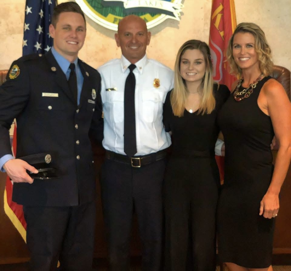 Shawn Steinert with family at fire department ceremony